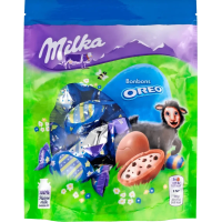 Шоколад Milka молочний у формі яйця з молочною начинкою зі шматочками печива Oreo 86 г